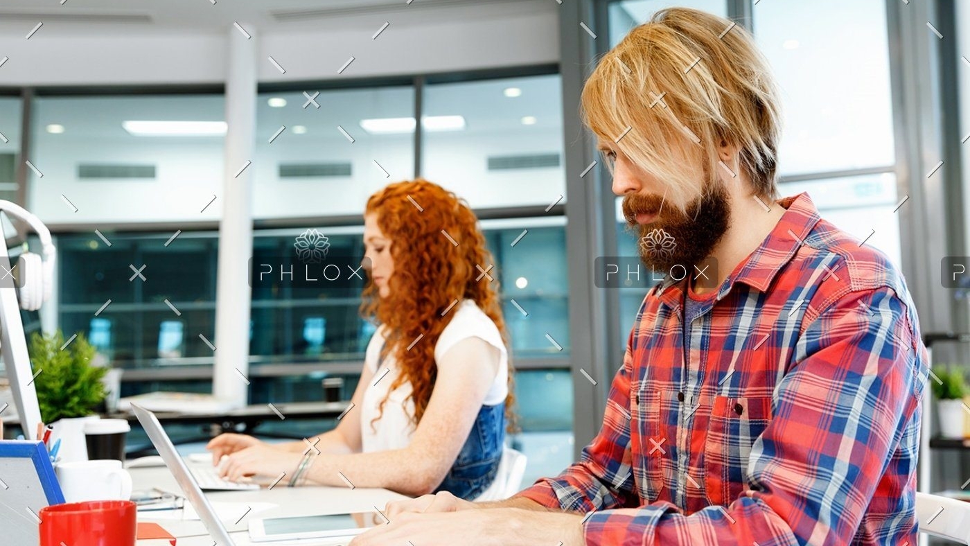 demo-attachment-1149-two-co-workers-working-together-PPVW2LA